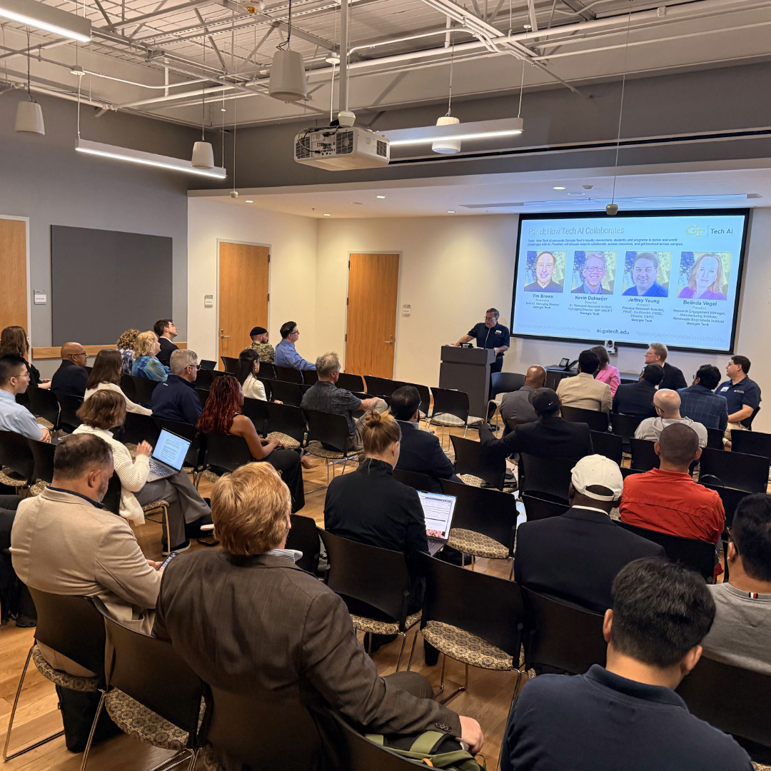 Audience members attend the opening panel of the Tech AI Symposium at Georgia Tech.